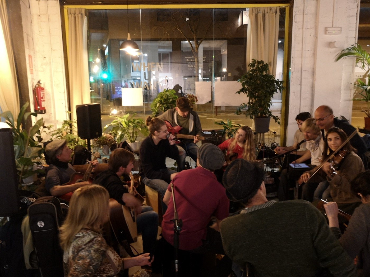 A crowd taking part in a live improv music event